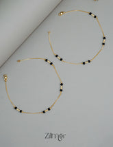 KT1011130 - Gold Plated Black beaded pair Anklet